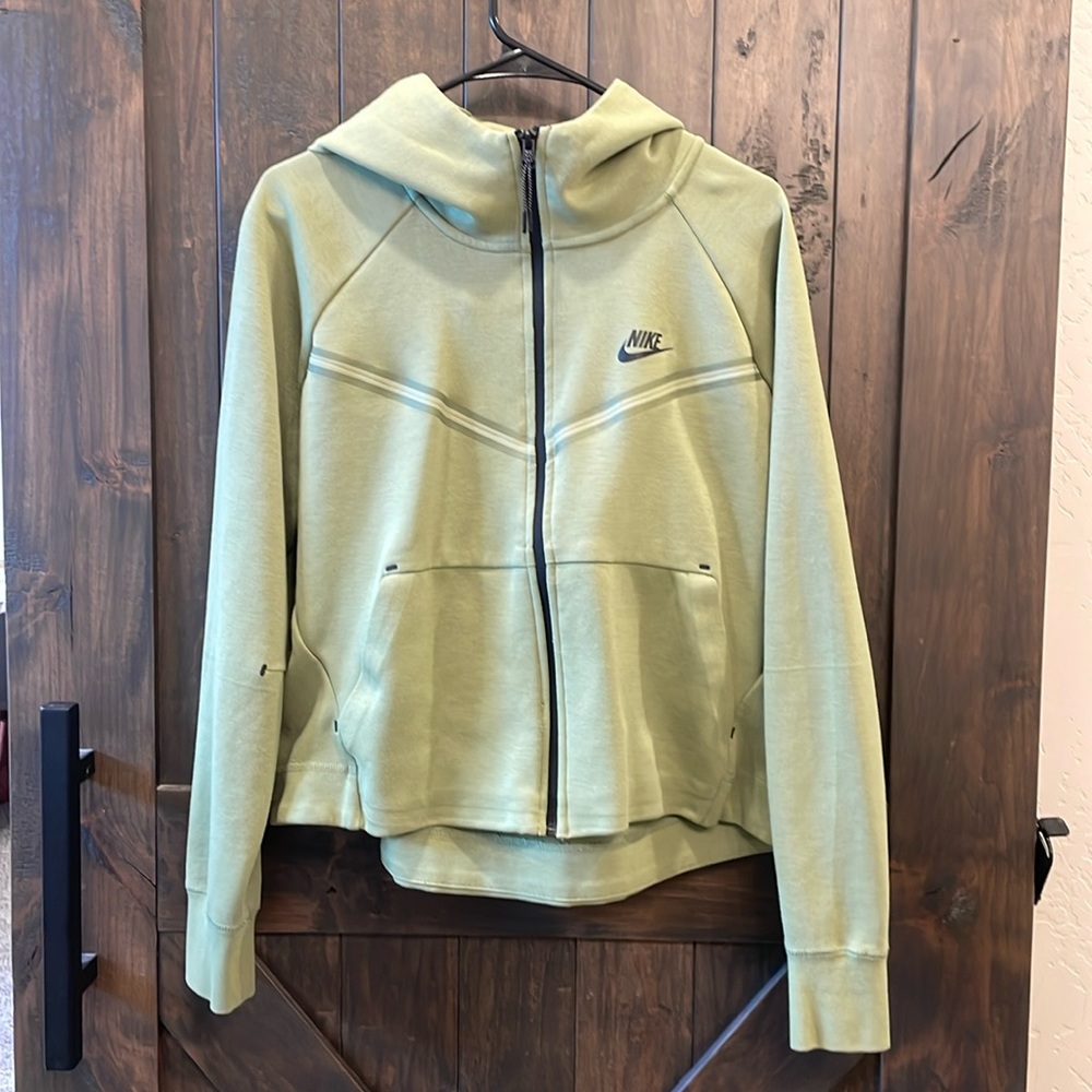 Green women’s Nike Tech hoodie